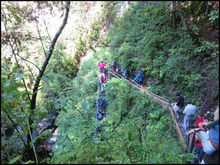 Scarisoara Ice Cave - people following diligently the stairs